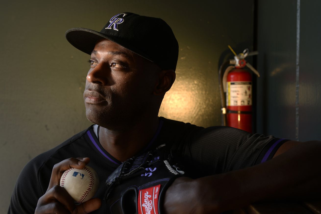 Colorado Rockies relieve pitcher LaTroy Hawkins in the dugout.